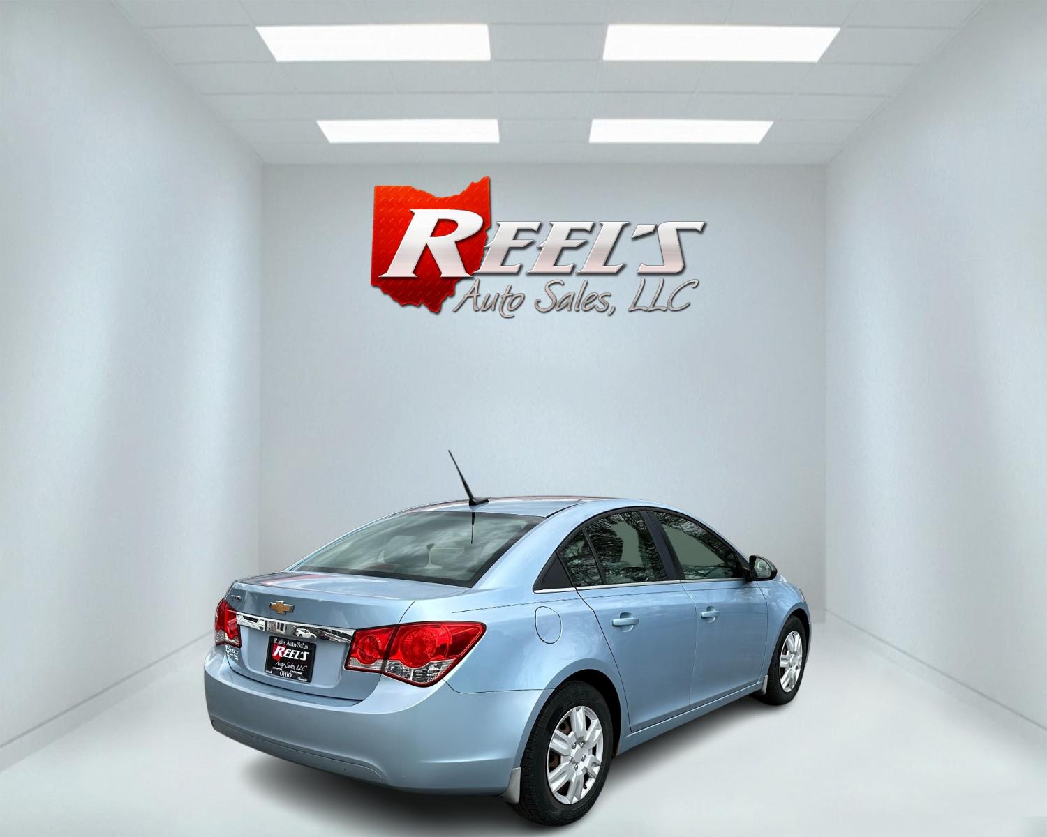 2011 Blue /Black Chevrolet Cruze LS Auto (1G1PC5SHXB7) with an 1.8L I4 DOHC 16V engine, 6-Speed Automatic transmission, located at 547 E. Main St., Orwell, OH, 44076, (440) 437-5893, 41.535435, -80.847855 - Photo #5